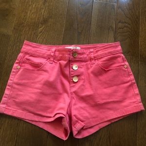 pink or melon colored shorts